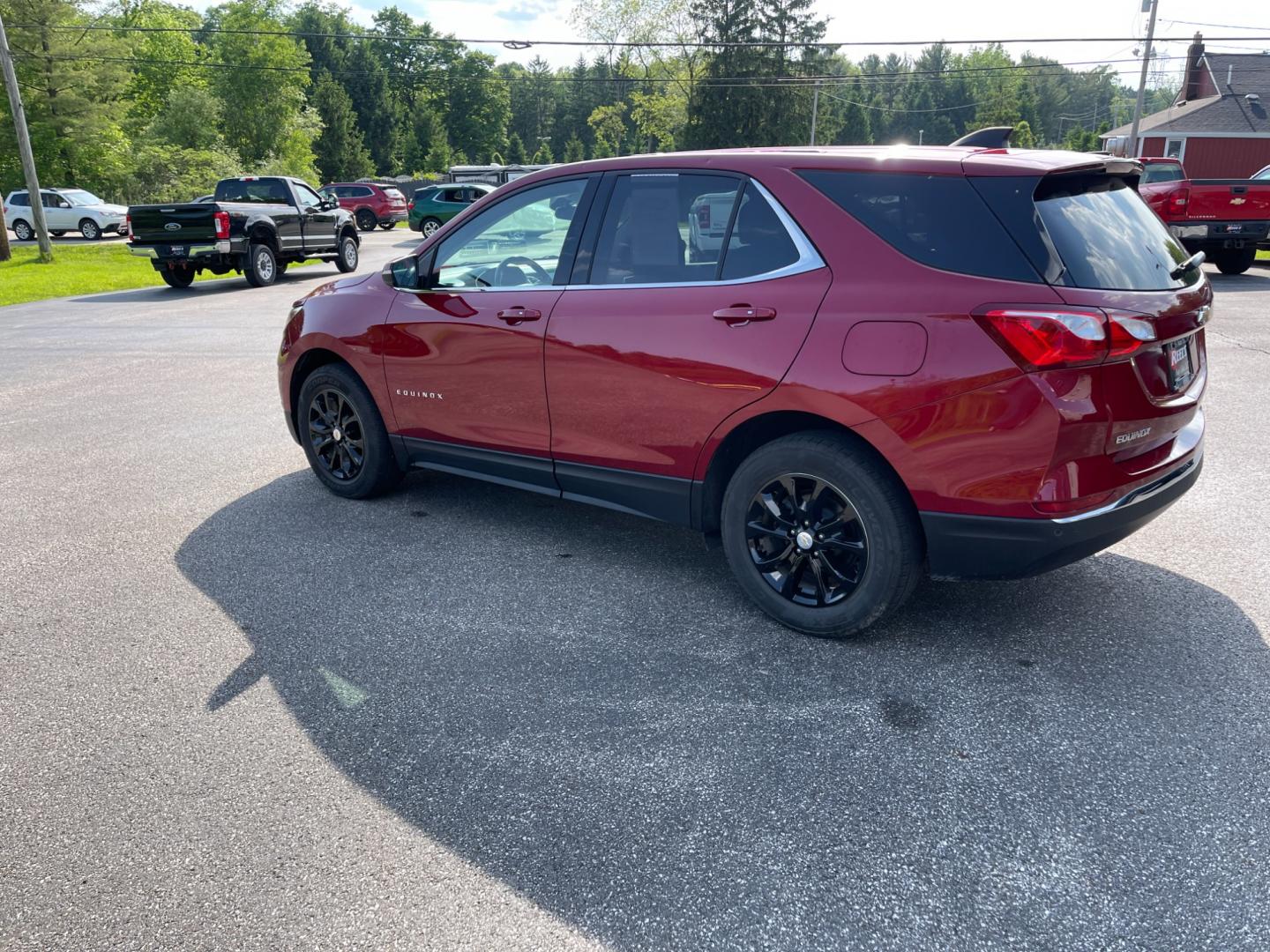 2018 Red /Black Chevrolet Equinox LT AWD (2GNAXSEV2J6) with an 1.5L I4 DOHC 16V TURBO engine, 6-Speed Automatic transmission, located at 11115 Chardon Rd. , Chardon, OH, 44024, (440) 214-9705, 41.580246, -81.241943 - This 2018 Chevrolet Equinox LT AWD with a 1.5L EcoTec Turbocharged engine and 6-speed automatic transmission offers a balanced blend of performance and fuel efficiency with a 30 MPG highway rating. This compact SUV is well-equipped for safety and convenience, featuring blind spot monitoring, rear cr - Photo#10